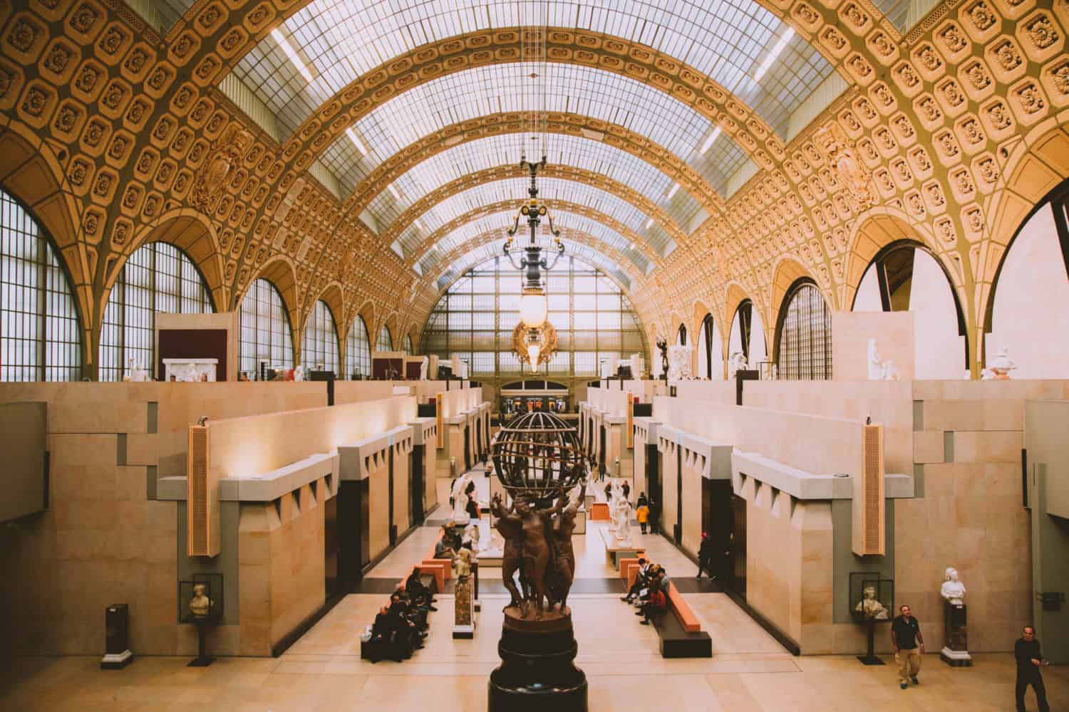 2. Musée D'Orsay Clocks Are Some Hidden Photography Spots In Paris 1 Rue de la Légion d'Honneur, 75007 (map here) The Musée d'Orsay is known for its impressionist painting collection, including famous artists like Monet, Renoir, and Van Gogh. The building itself is a gorgeous Instagram spot in Paris for its light-filled, golden walls and historic treasures. However, hidden deep in the Musee d'Orsay are two beautifully intricate clocks. The first sits at the front of the large main hall above the main entrance. The second sits in front of a huge window with a view directly out to the Sacré-Coeur on top of a hill across the city. The second, larger clock is a great photography spot in Paris for silhouette pictures, and shadow/light play. Just remember to be patient because this place is very busy, with lots of people who are going to get in your frame! Vacationing with cameras? We're sharing here about all the great we bring when traveling.