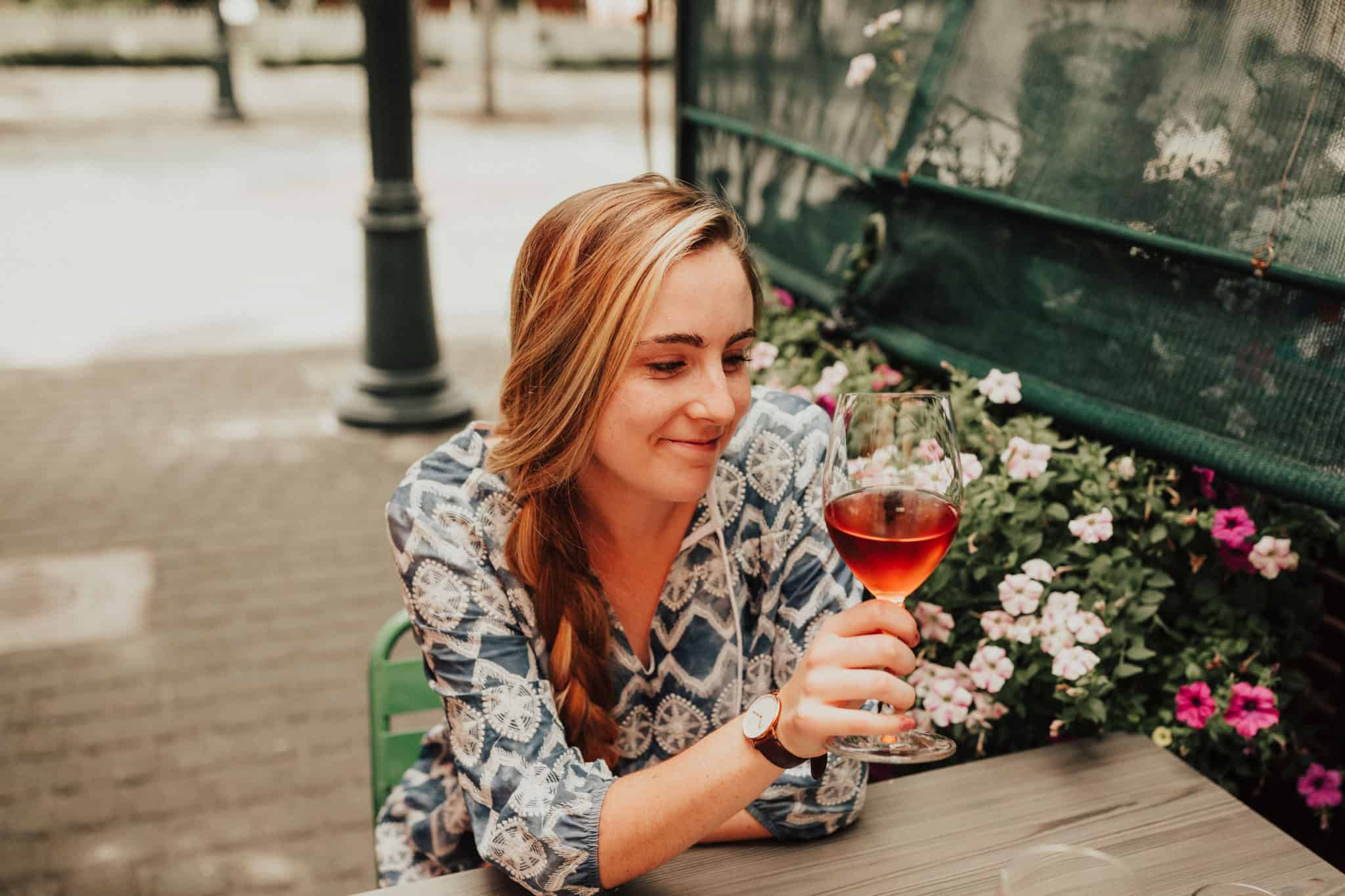 Emily drinking wine at Basque Market - Boise, Idaho