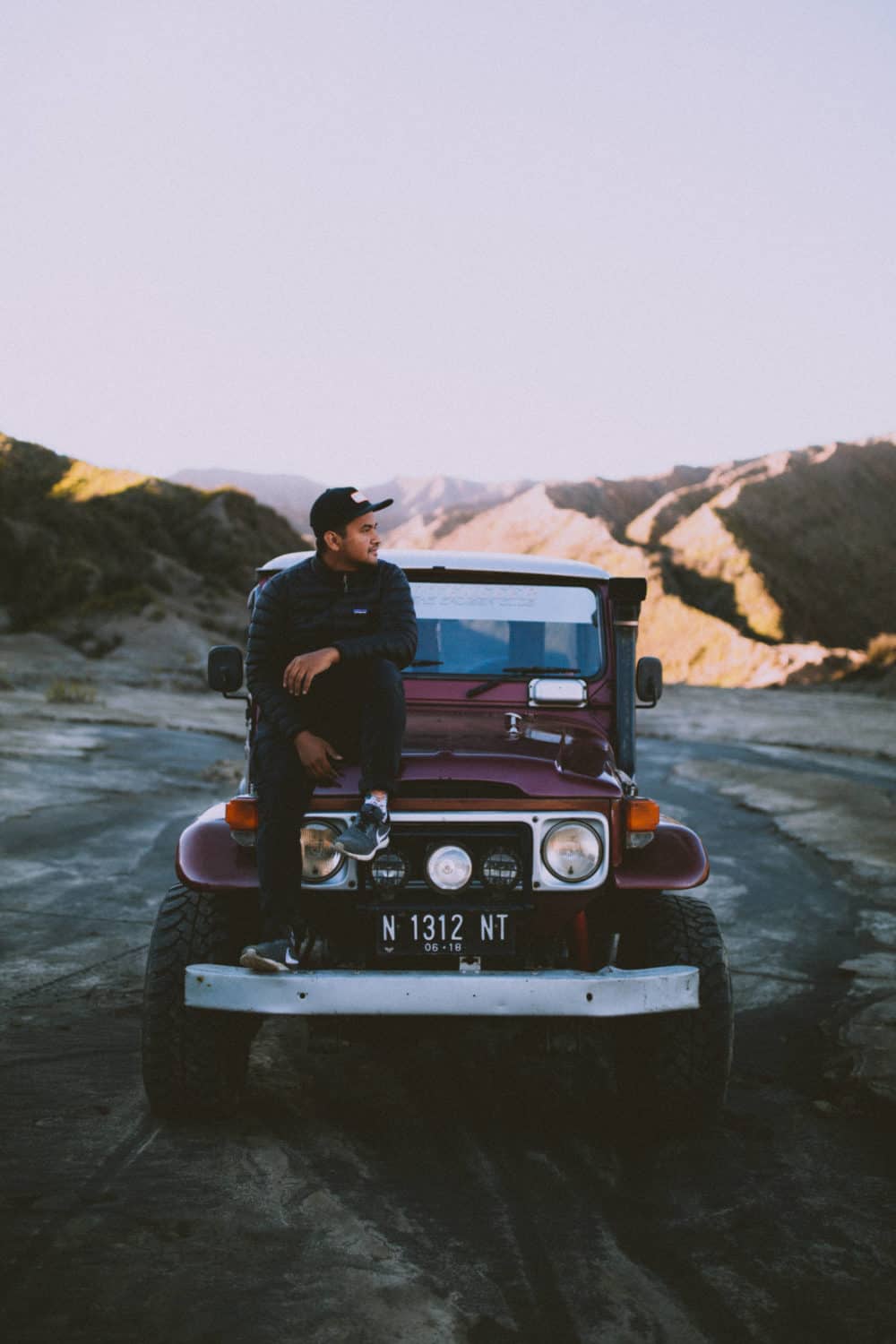 Berty sitting on a Jeep Mount Bromo