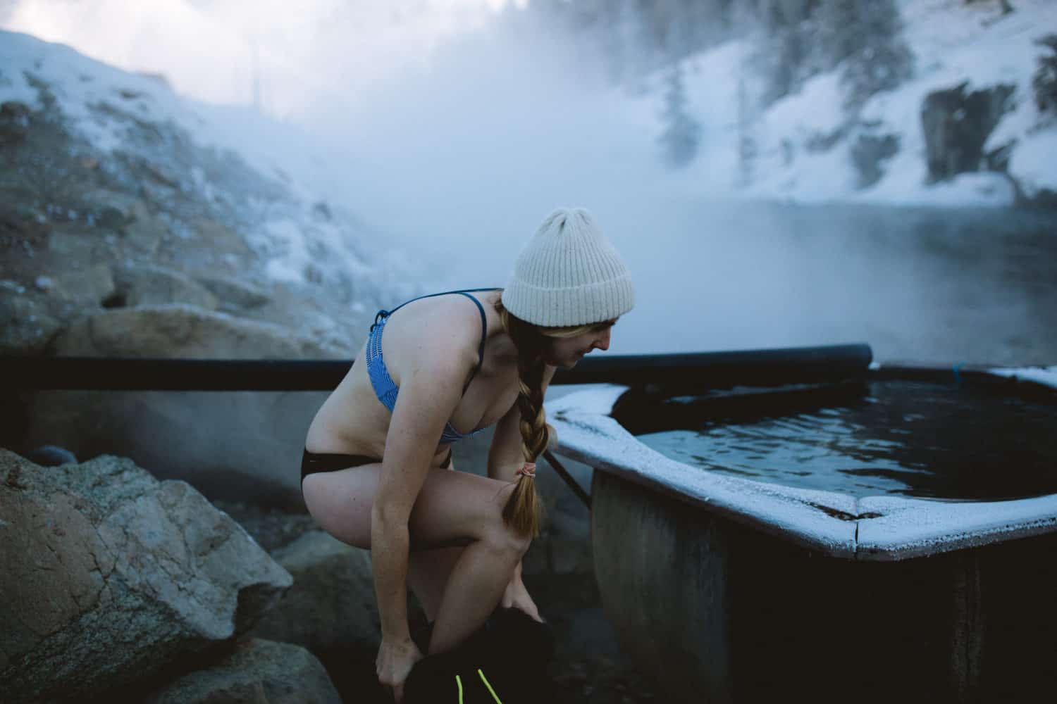 Emily Mandagie in Boat Bot hot springs in winter