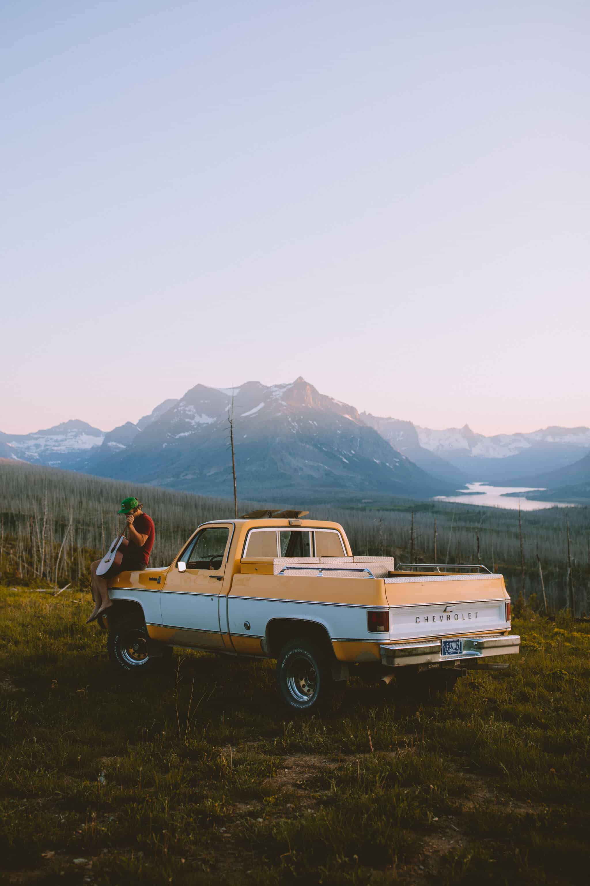 Man on truck, searching for free camping