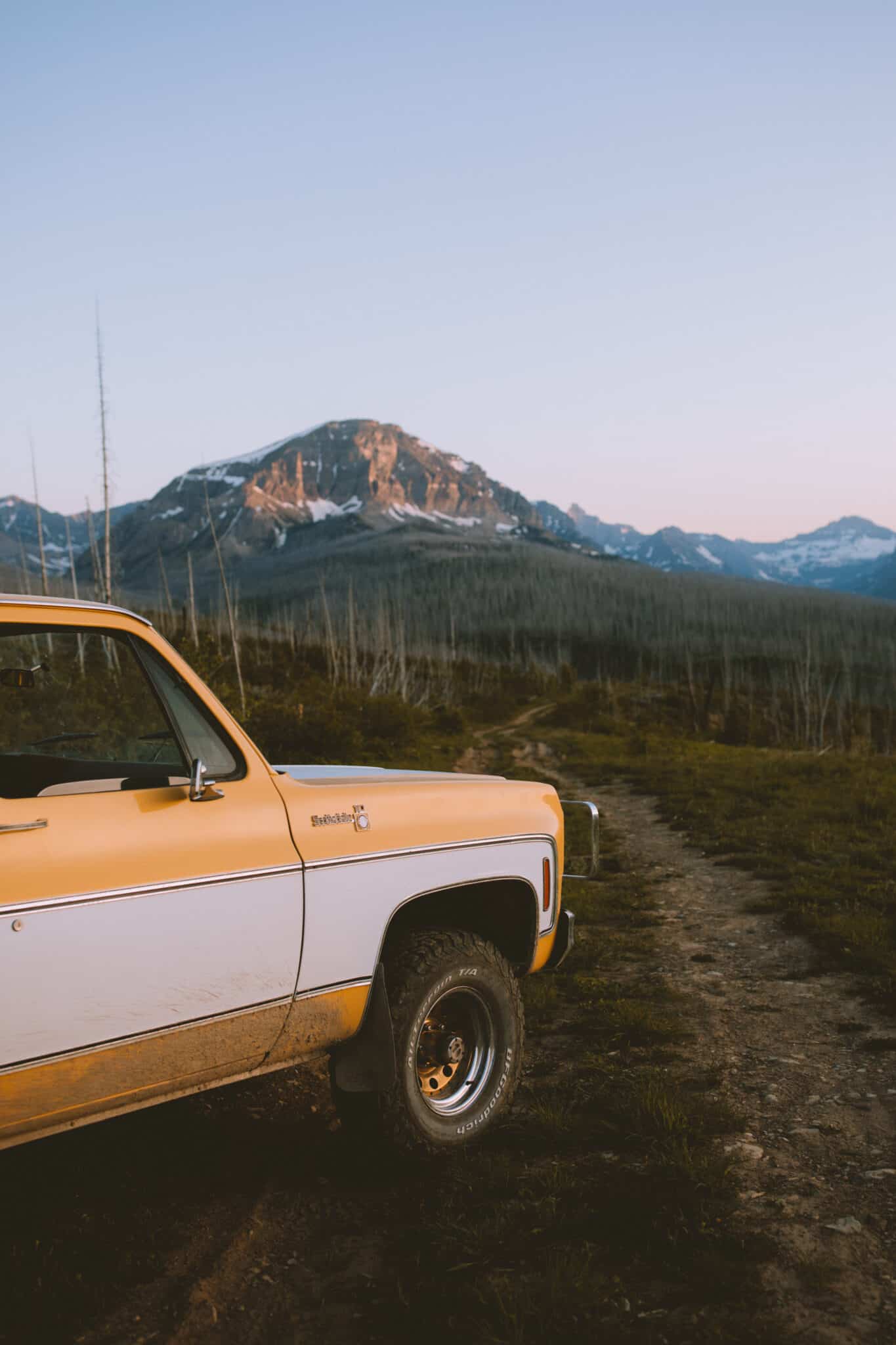 front of truck at free campsite in Montana