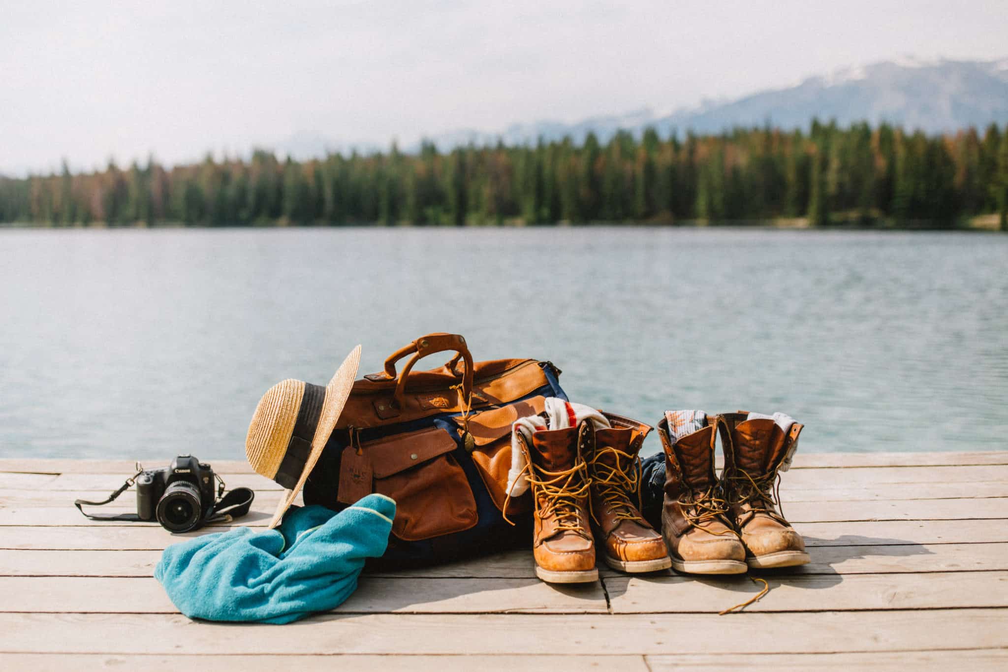 Bag and shoes on dock at Lake Anette, Jasper National Park