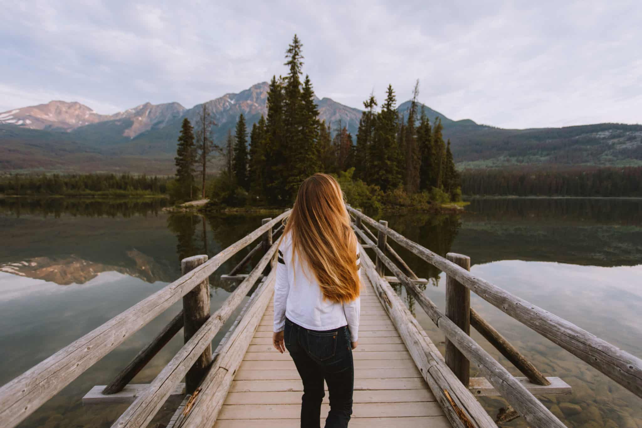 Emily Mandagie walking to Pyramid Island, Jasper National Park