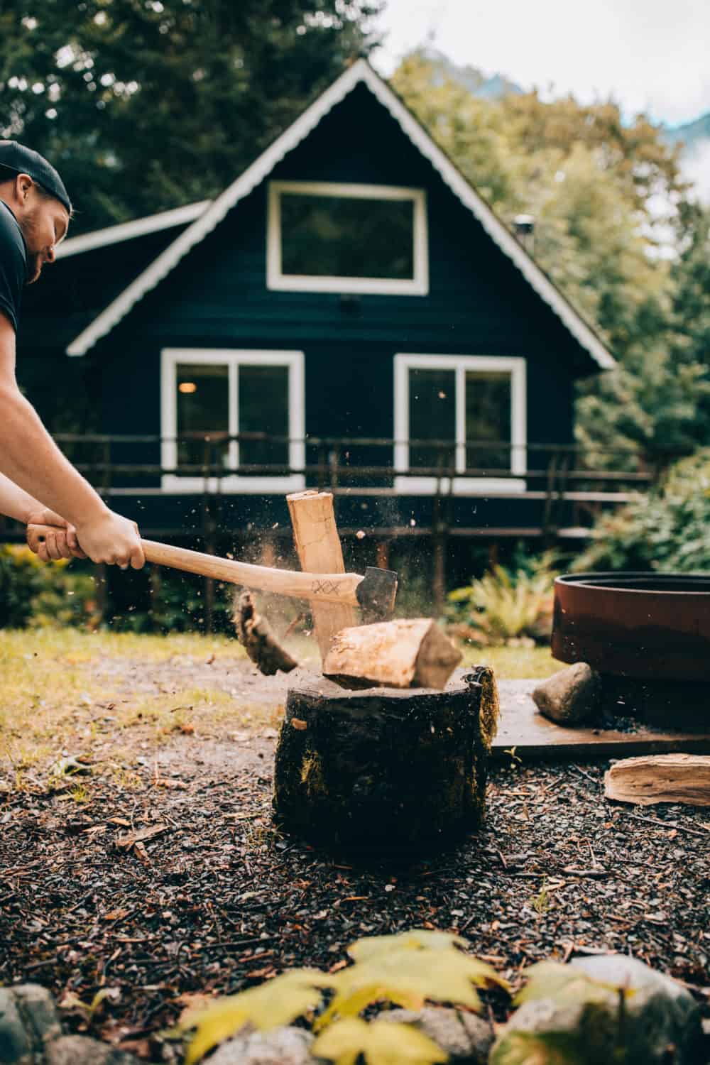 South Fork Cabin - Cameron chopping wood - TheMandagies.com