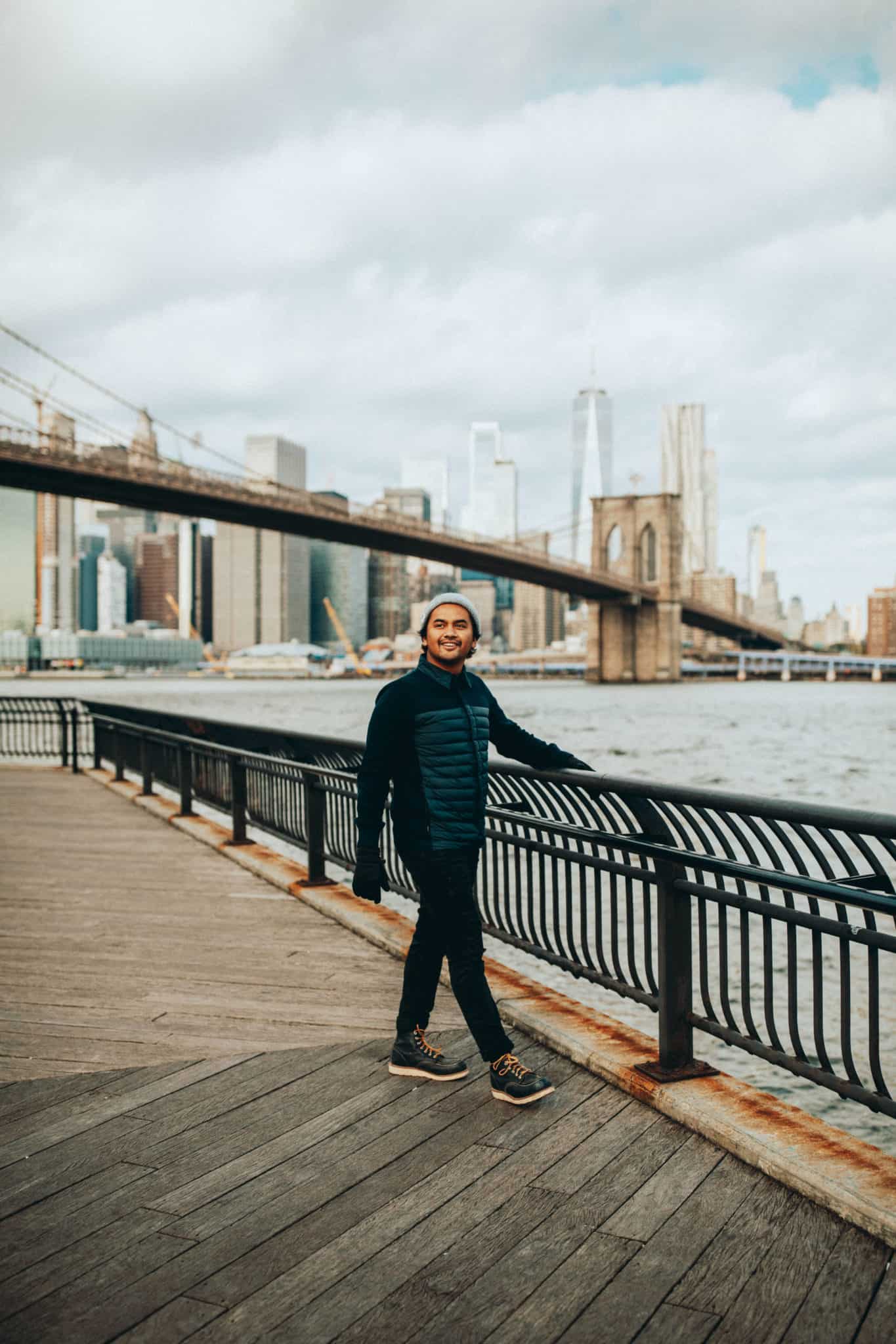 Berty Mandagie standing st Brooklyn Bridge Park, NYC