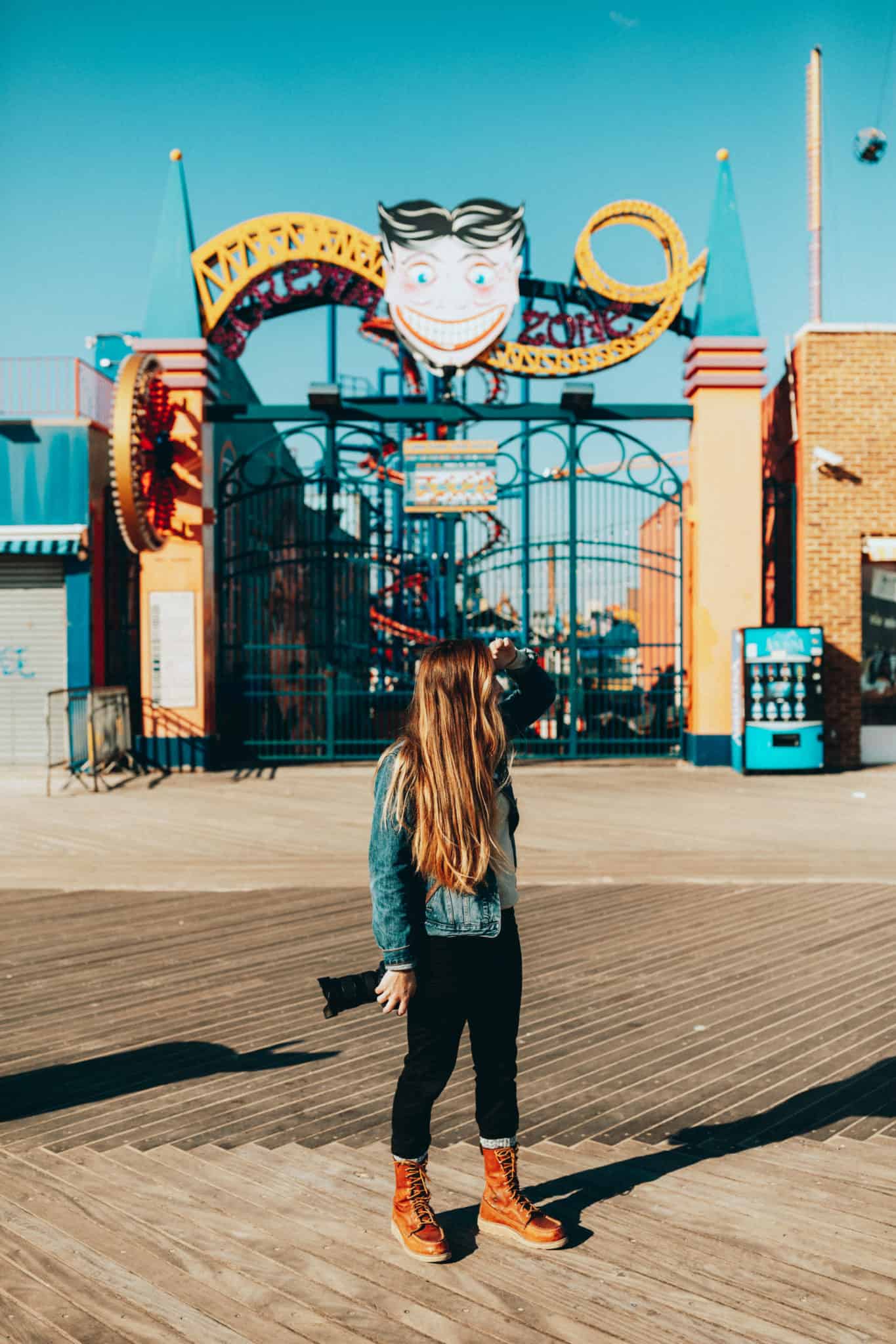 Emily standing, Coney Island Sign