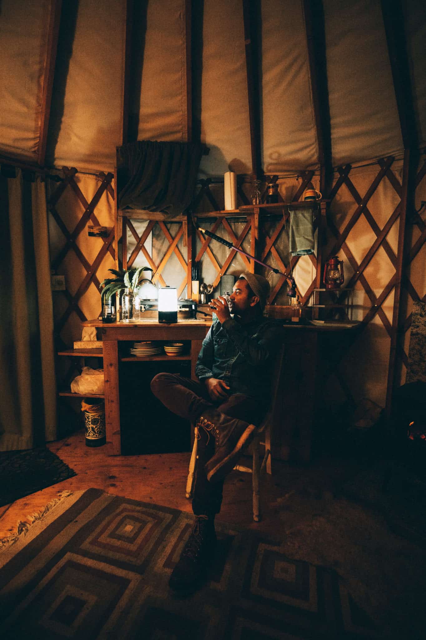 interior of yurt with lights and wine