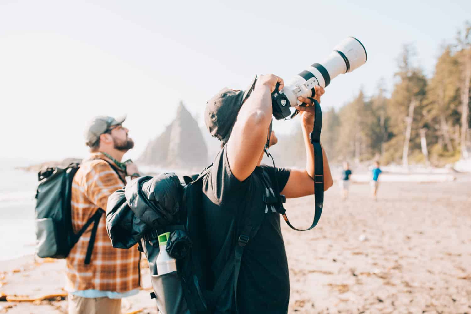 Berty Mandagie photographing wildlife at Rialto Beach, Olympic Peninsula