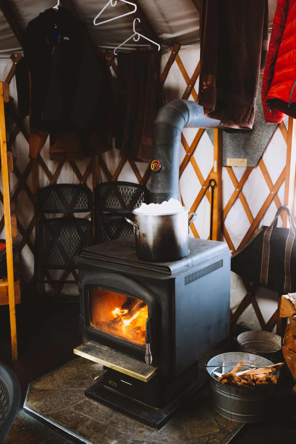 Melting snow on wood-burning stove