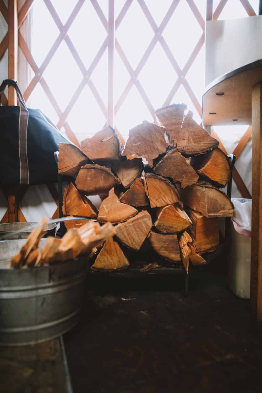 firewood pile inside the yurt