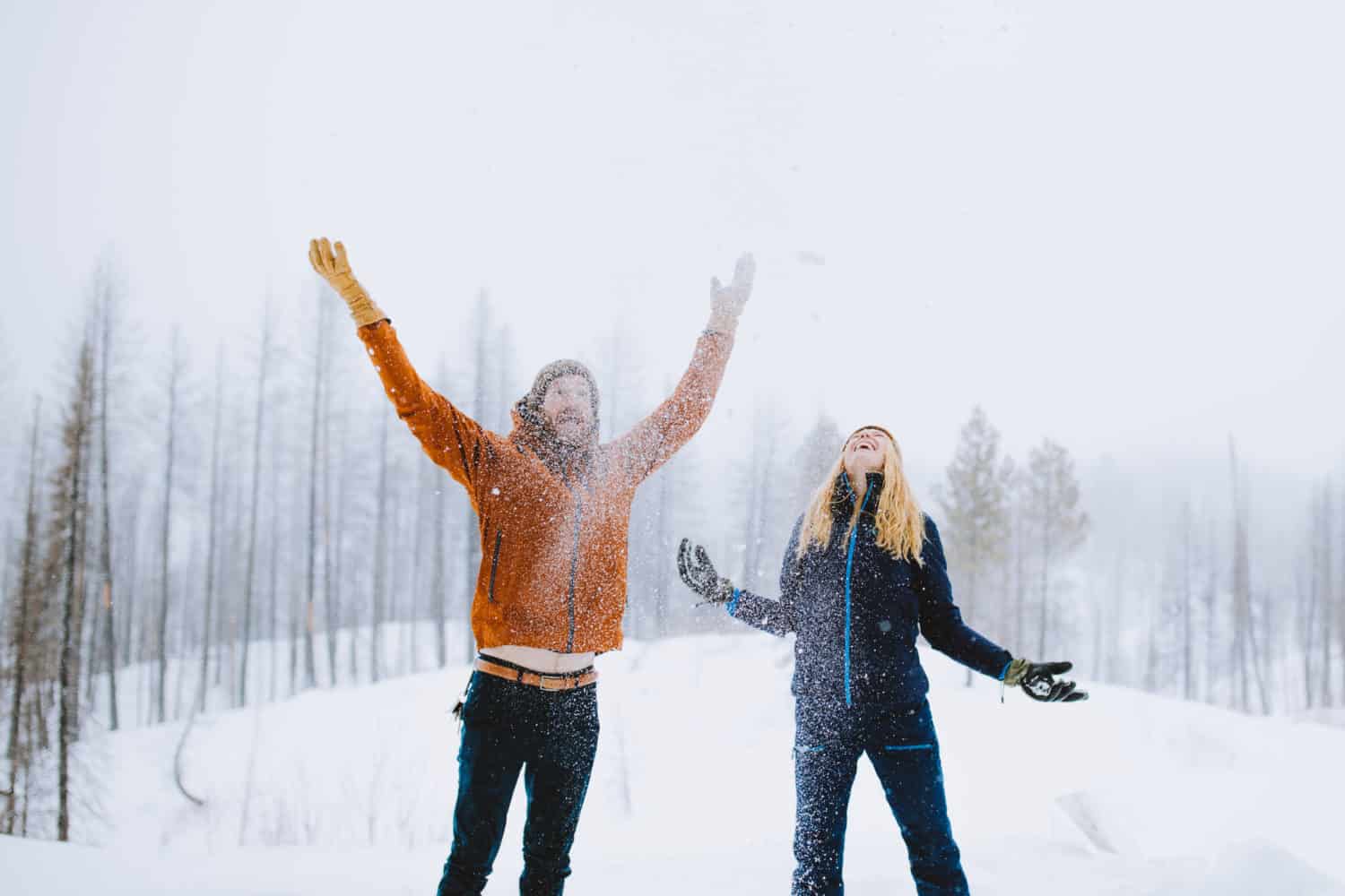 playing in the snow while winter yurt camping