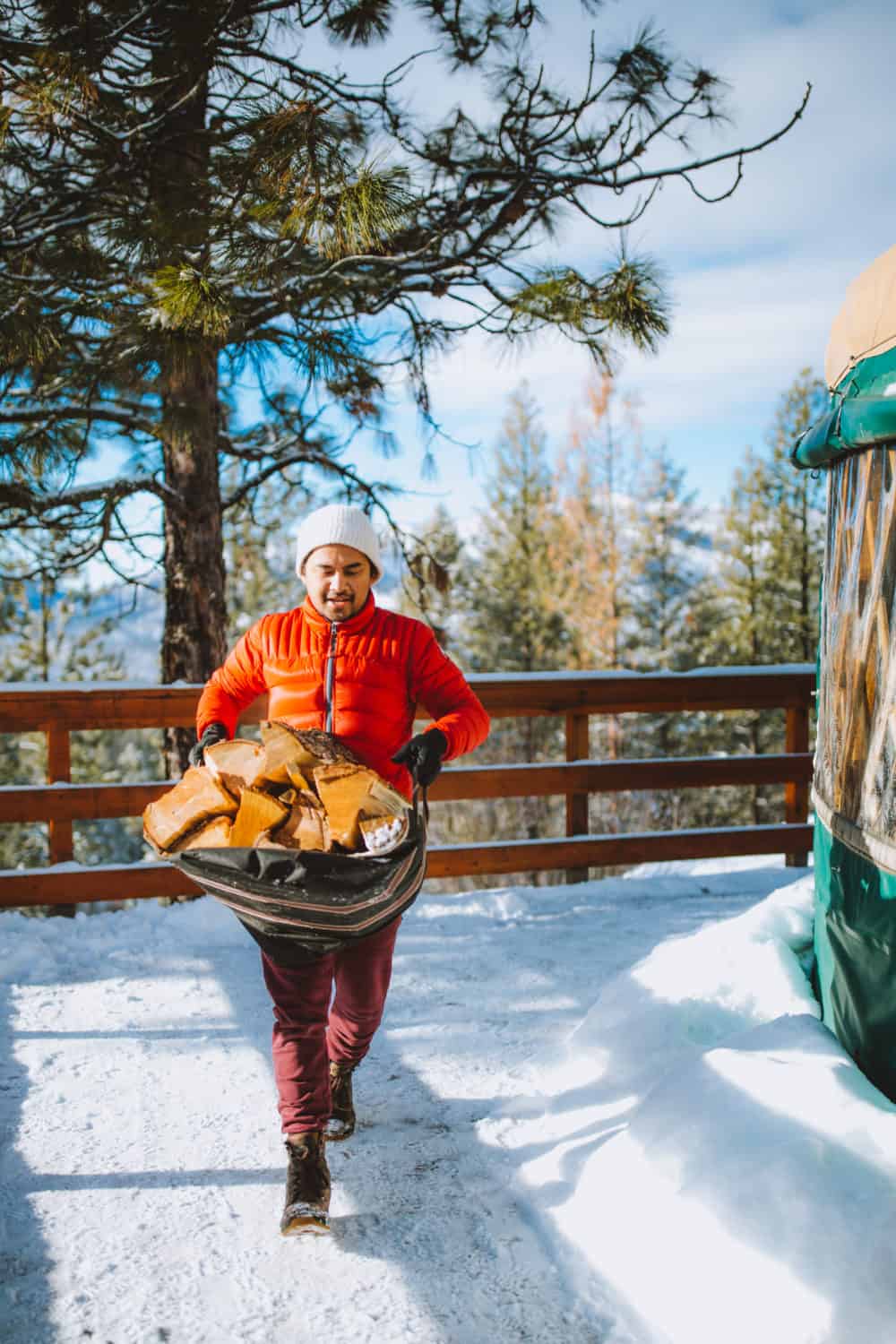 Berty Mandagie collecting firewood