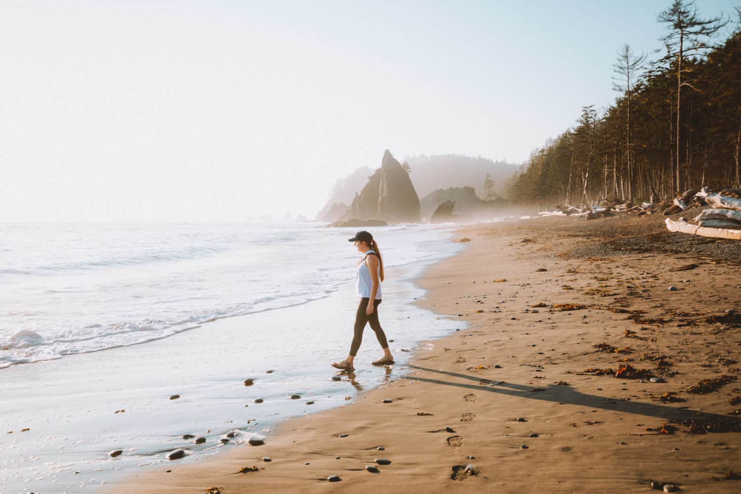 Emily Mandagie hiking the Hole In The Wall Hike - Rialto Beach, Olympic National Park- TheMandagies.com