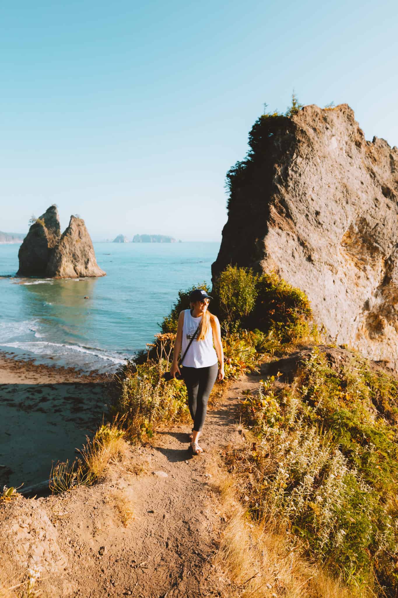 Emily standing at Rialto Beach viewpoint