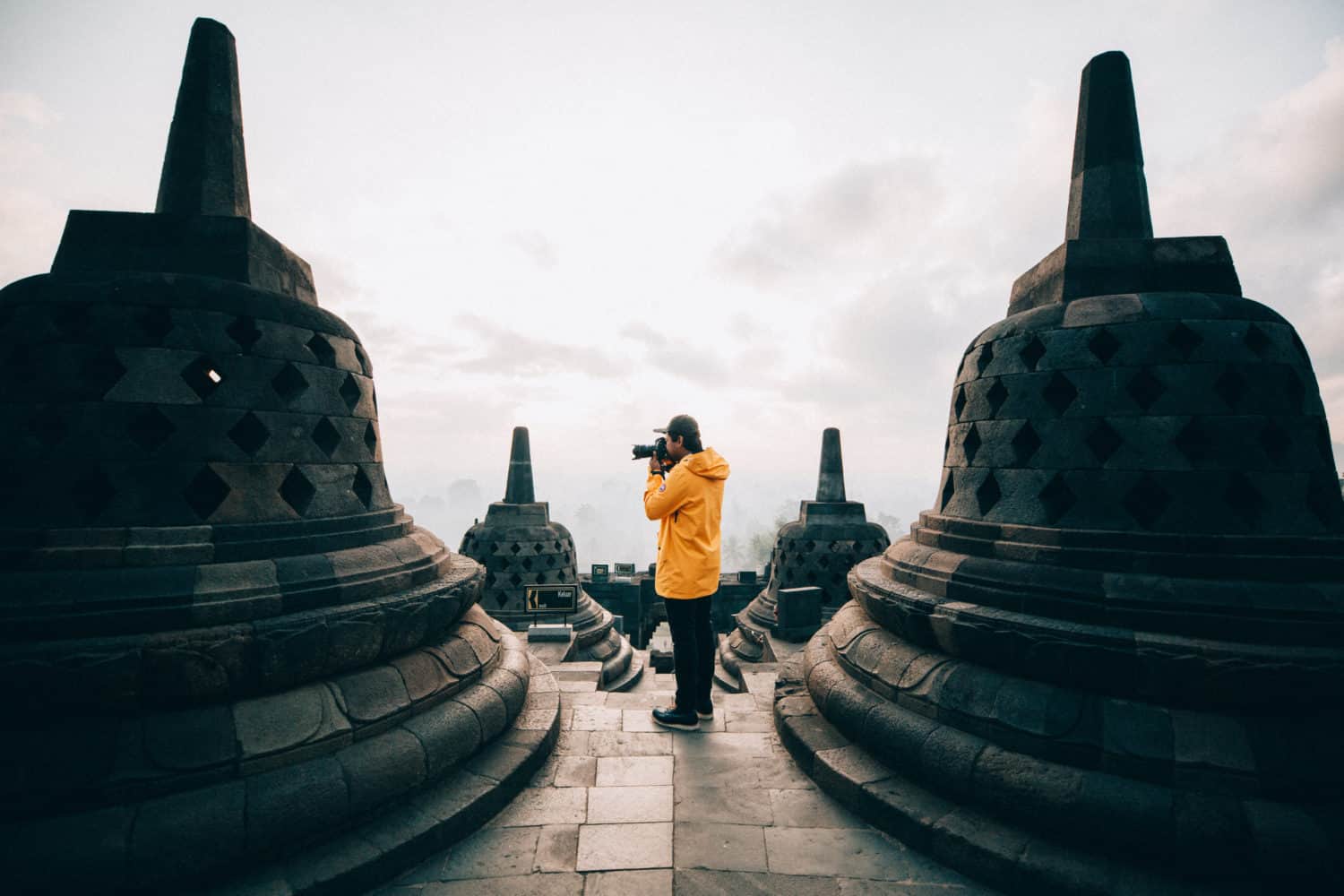 Berty standing between stupas - Borobudur Temple Indonesia