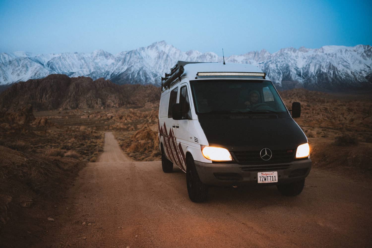 Berty Mandagie driving on Movie Road in Alabama Hills