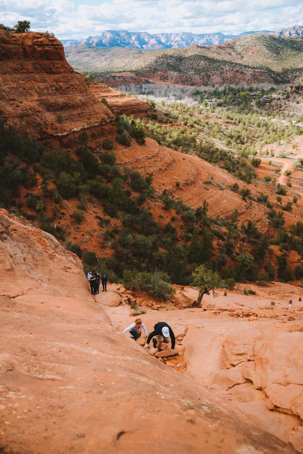 Climbing the rocks at Cathedral Rock hike