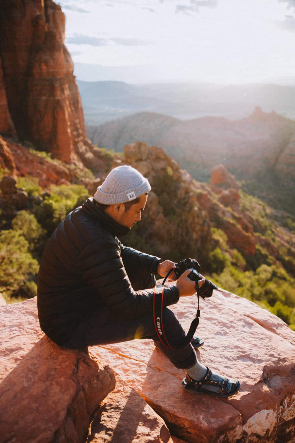 Berty Mandagie sitting at Cathedral Rock, Sedona - Shot with Canon EOS R