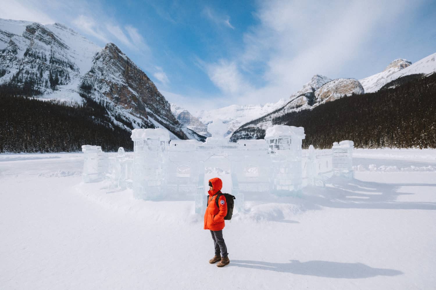 Berty standing in front of ice castle Lake Louise Banff - TheMandagies.com