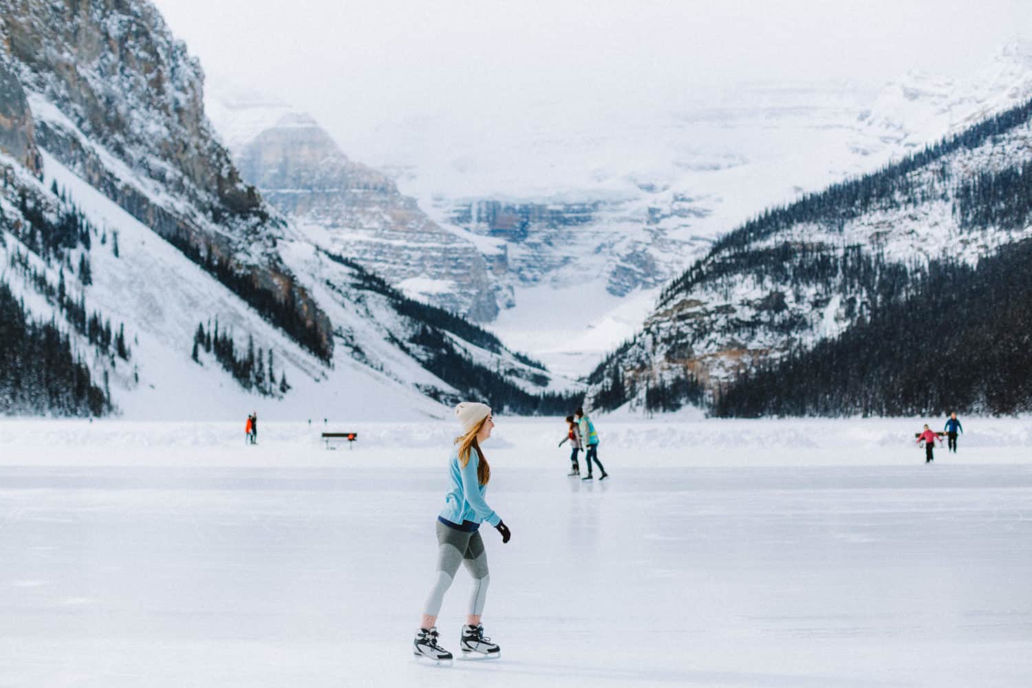 Emily ice skating on Lake Louise - TheMandagies.com