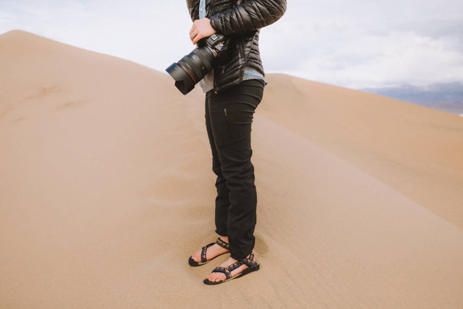 Emily Mandagie standing on Mesquite Flat Sand Dunes - One Day In Death Valley