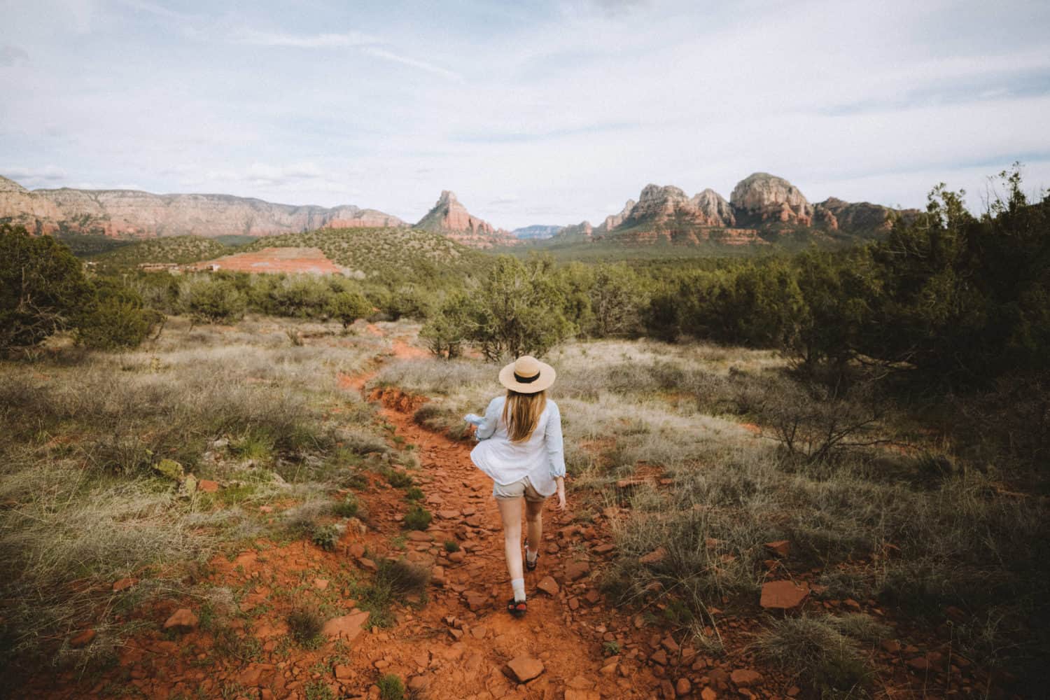 Emily walking on hiking trail in Sedona - TheMandagies.com