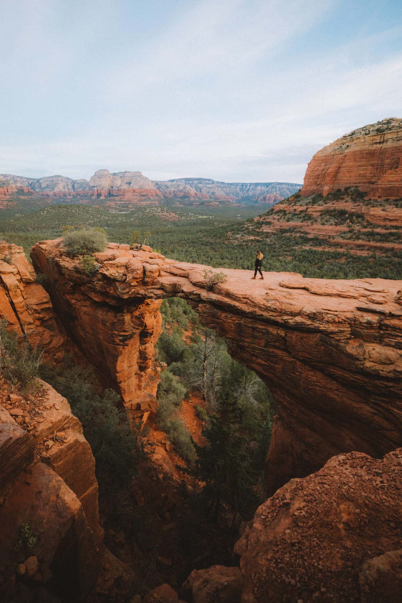 Emily walking on Devil's Bridge - Southwest Road Trip Destination -TheMandagies.com