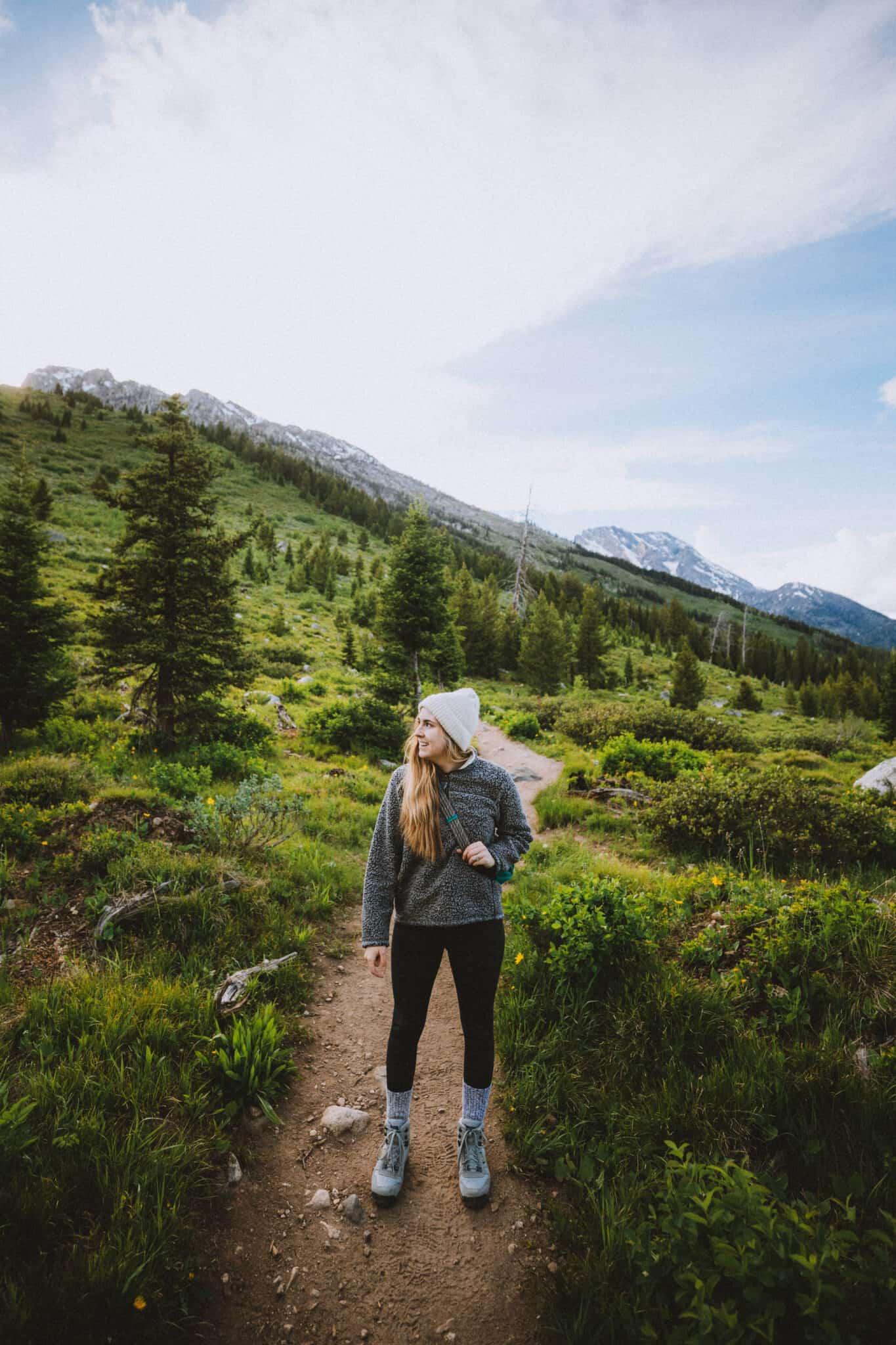 Emily standing on String Lake Hike - TheMandagies.com