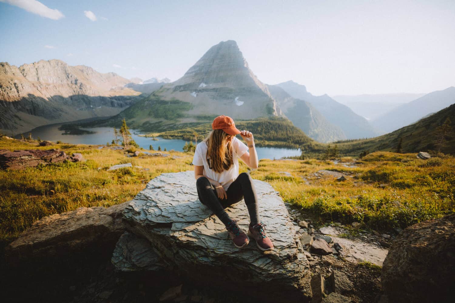 Emily sitting on rock at Hidden Lake Trail