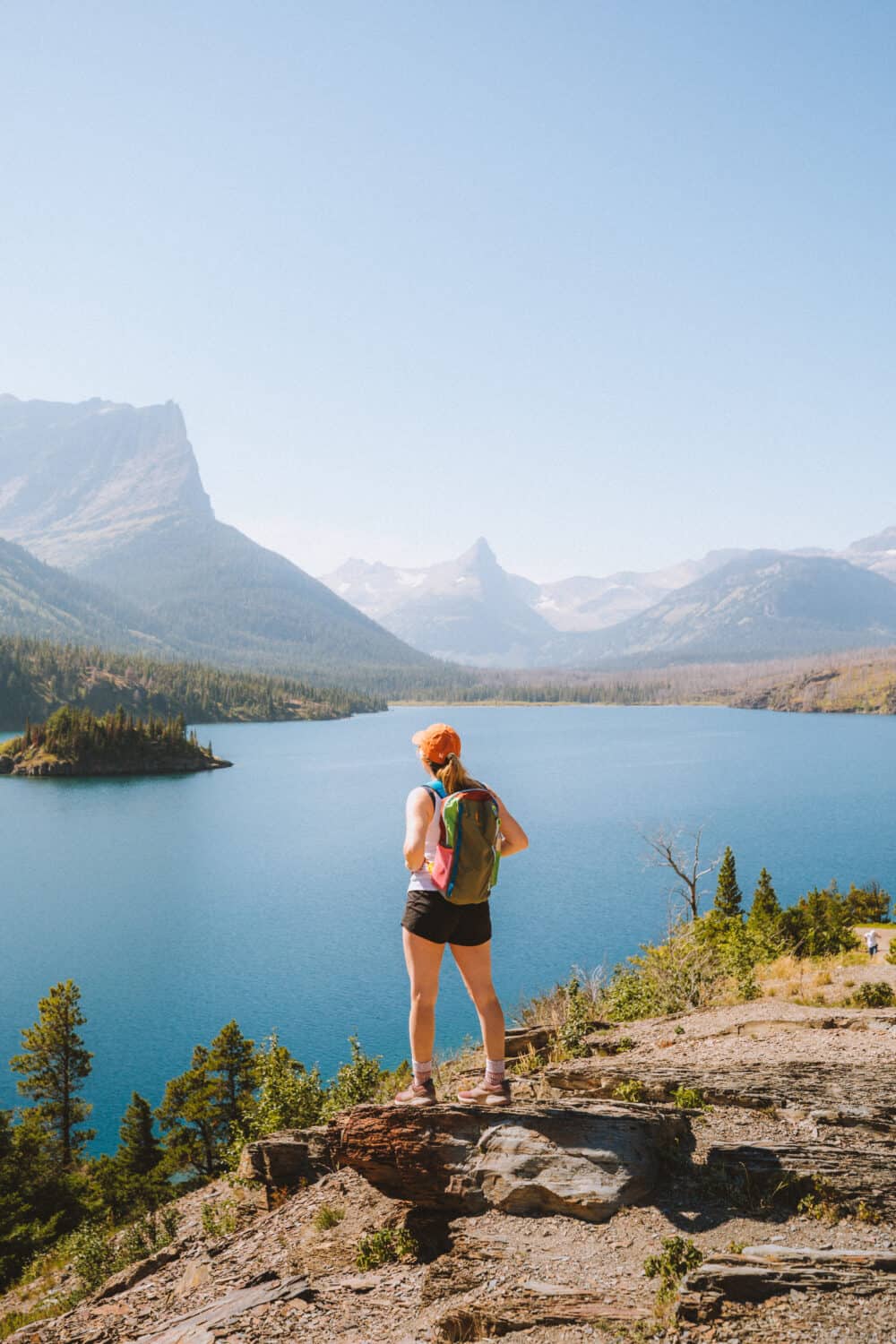 Emily Mandagie standing at Sun Point in Glacier National Park