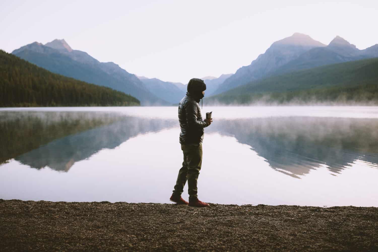 Berty walking at Bowman Lake during sunrise