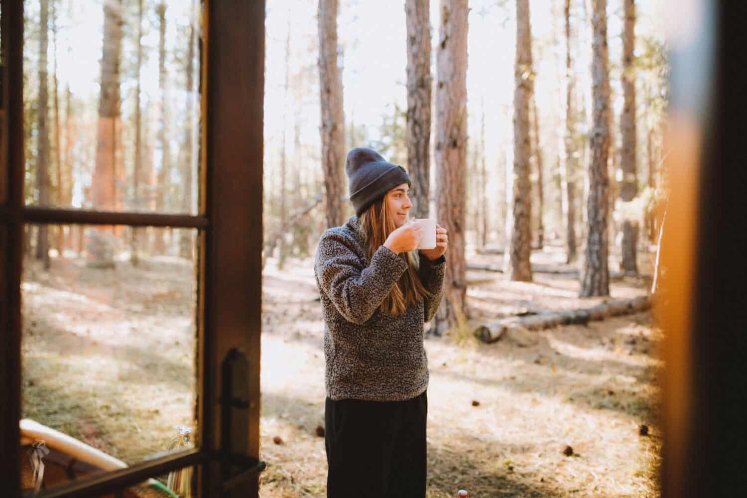 Emily sipping coffee at best hotel in Oregon - TheMandagies.com