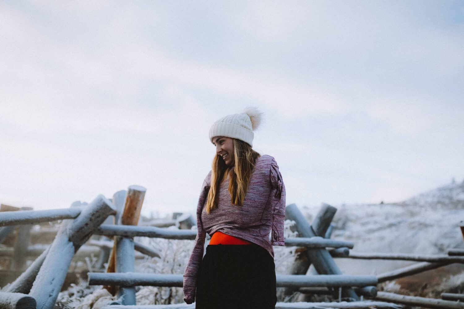 Emily Mandagie at Boiling River in Winter Yellowstone - TheMandagies.com