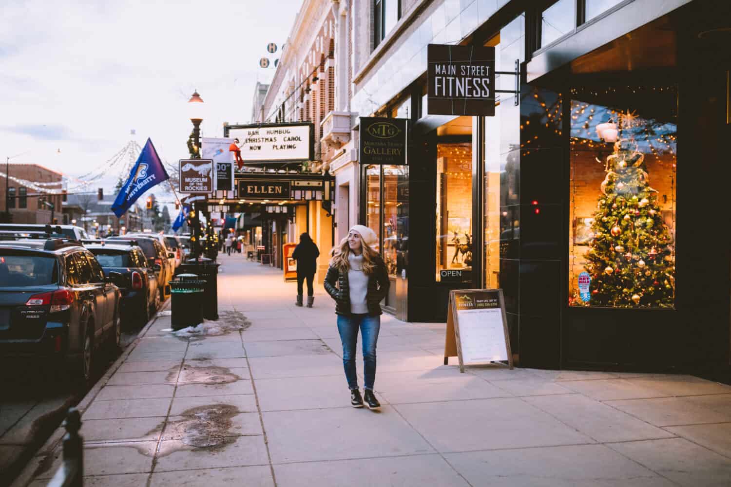 Emily Mandagie walking downtown during Christmas, winter in Bozeman - TheMandagies.com