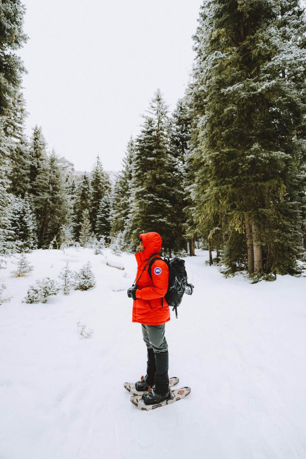 Berty Mandagie snowshoeing in Hyalite Canyon - TheMandagies.com