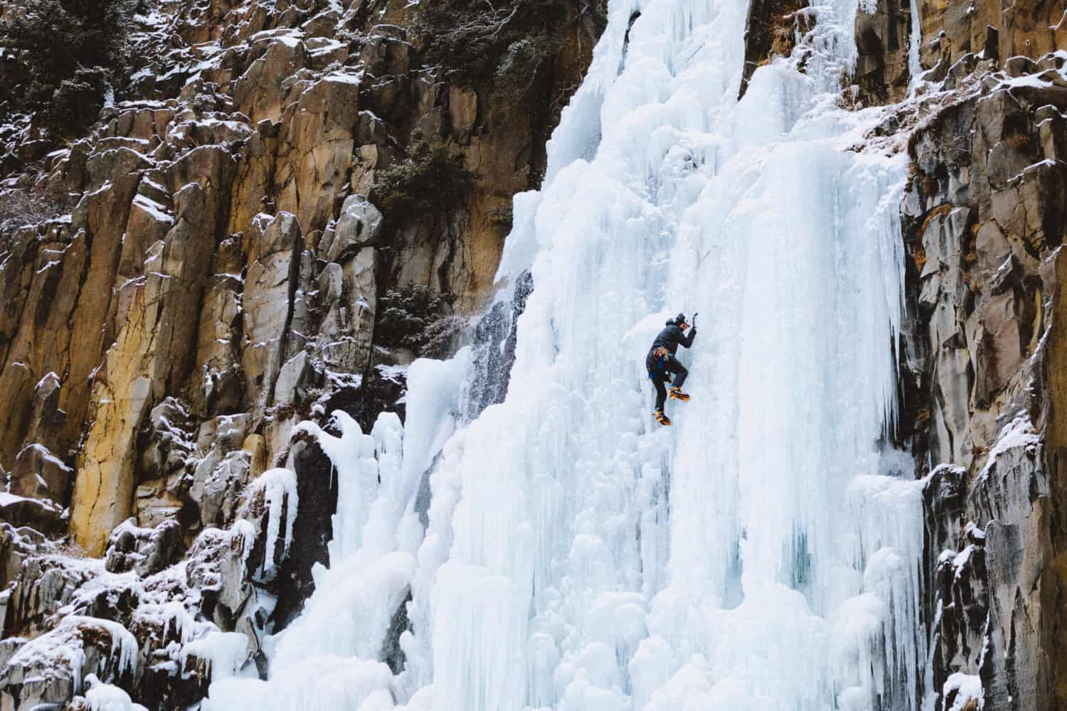 Ice Climber on Frozen Palisade Falls, Hyalite Canyon, Bozeman Montana - TheMandagies.com