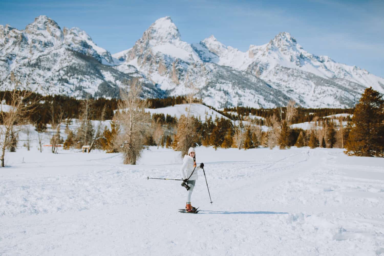 Emily Mandagie snowshoeing on Taggart Lake Trail - Grand Teton National Park, Wyoming - TheMandagies.com