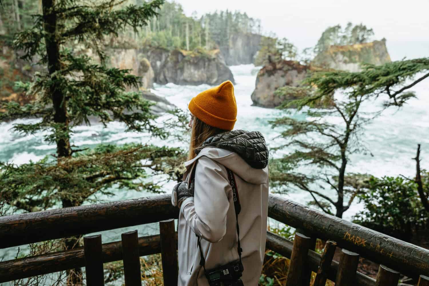 Emily Mandagie standing at Cape Flattery, Washington - TheMandagies.com