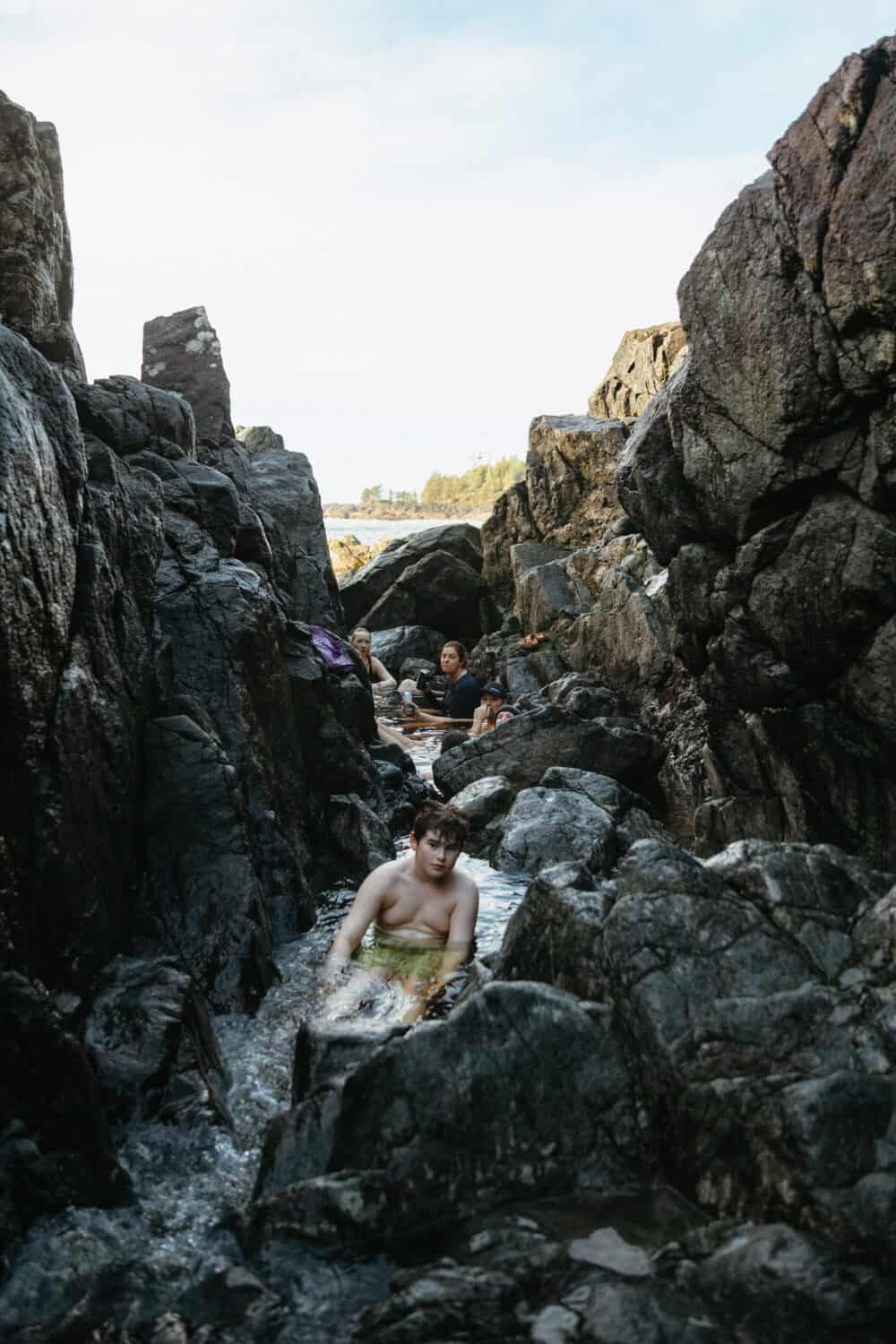 People soaking in Hot Springs Cove Tofino, TheMandagies.com