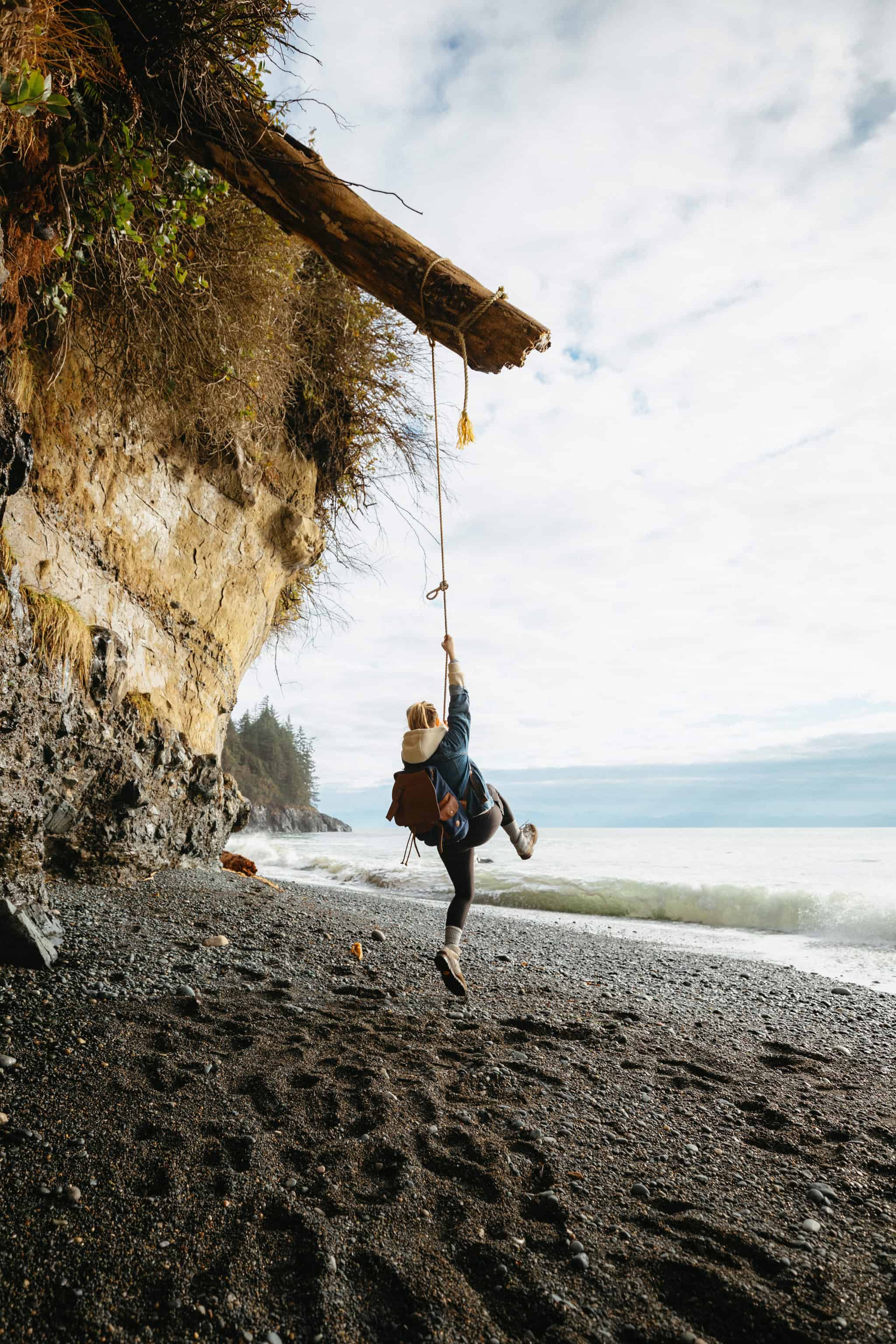Emily Mandagie on rope swing at Mystic Beach, Vancouver Island - TheMandagies.com