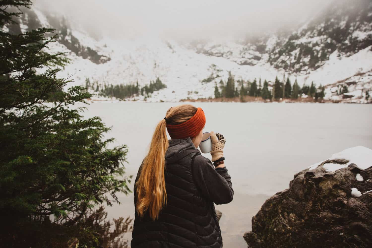 Emily Mandagie sipping coffee at Heather Lake - Mountain Loop Highway - Hiking Trails Near Seattle, Washington - Themandagies.com