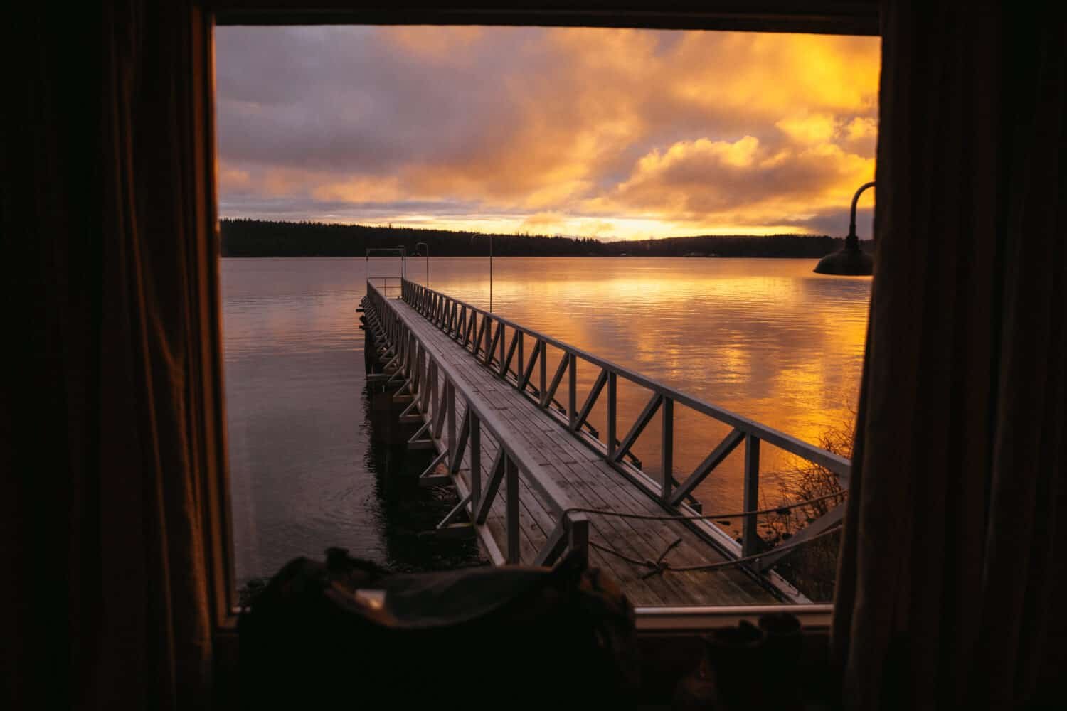 Sunrise from our room - Beach House, Dolphins Resort - Campbell River, BC - TheMandagies.com