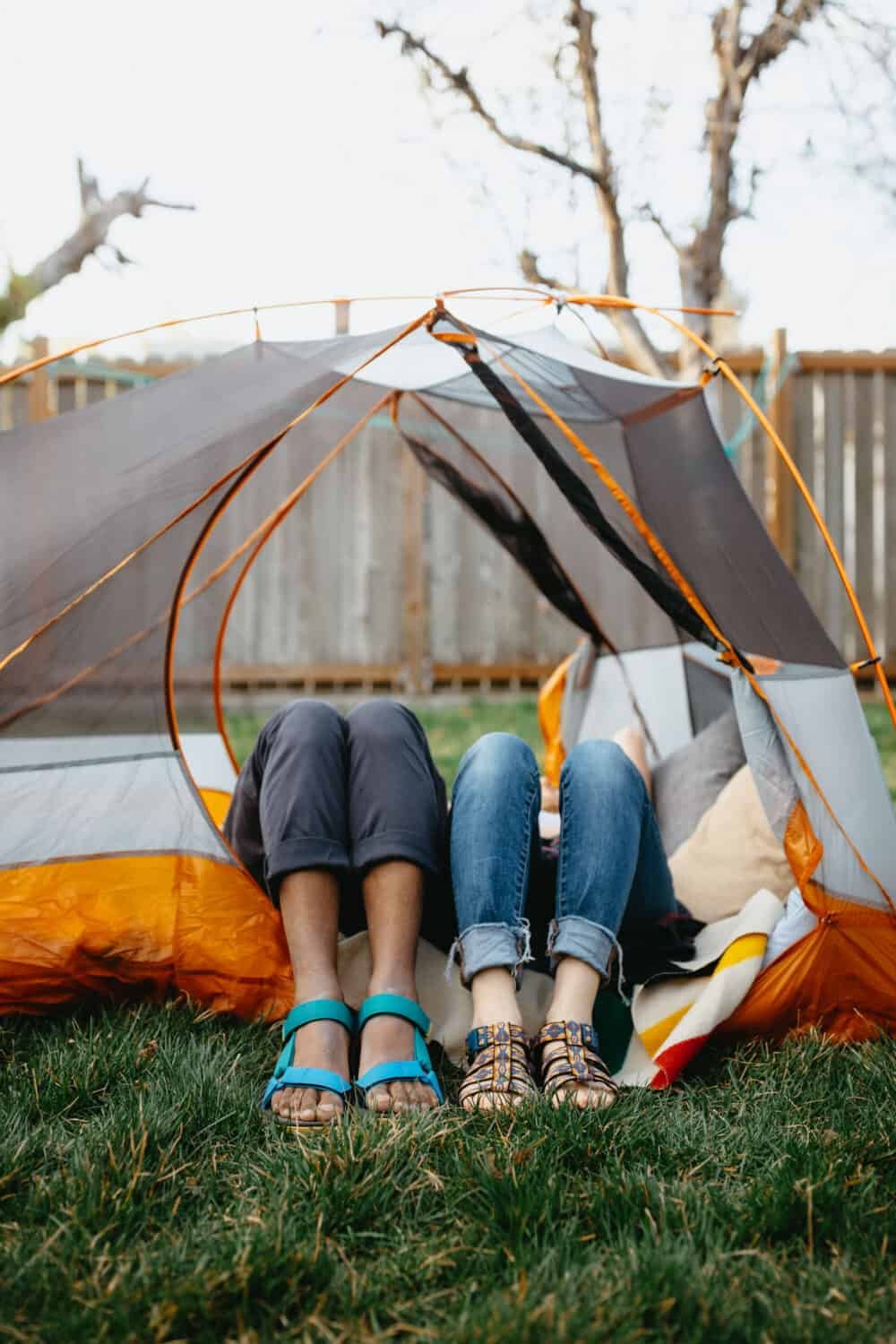 Emily and Berty Mandagie shoe shot inside tent