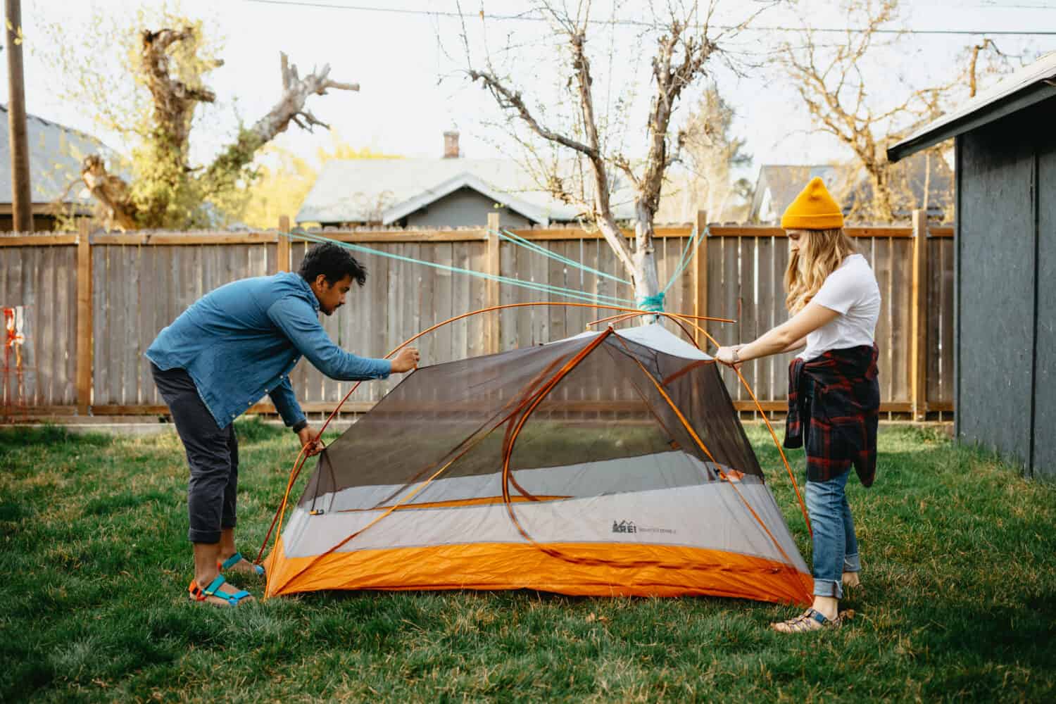 Berty and Emily setting up backyard tent