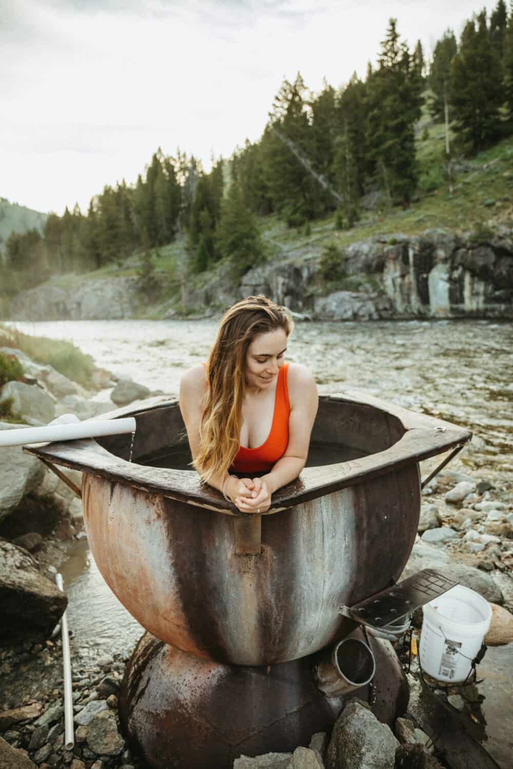 Emily Mandagie in hot springs in Idaho near Stanley, ID