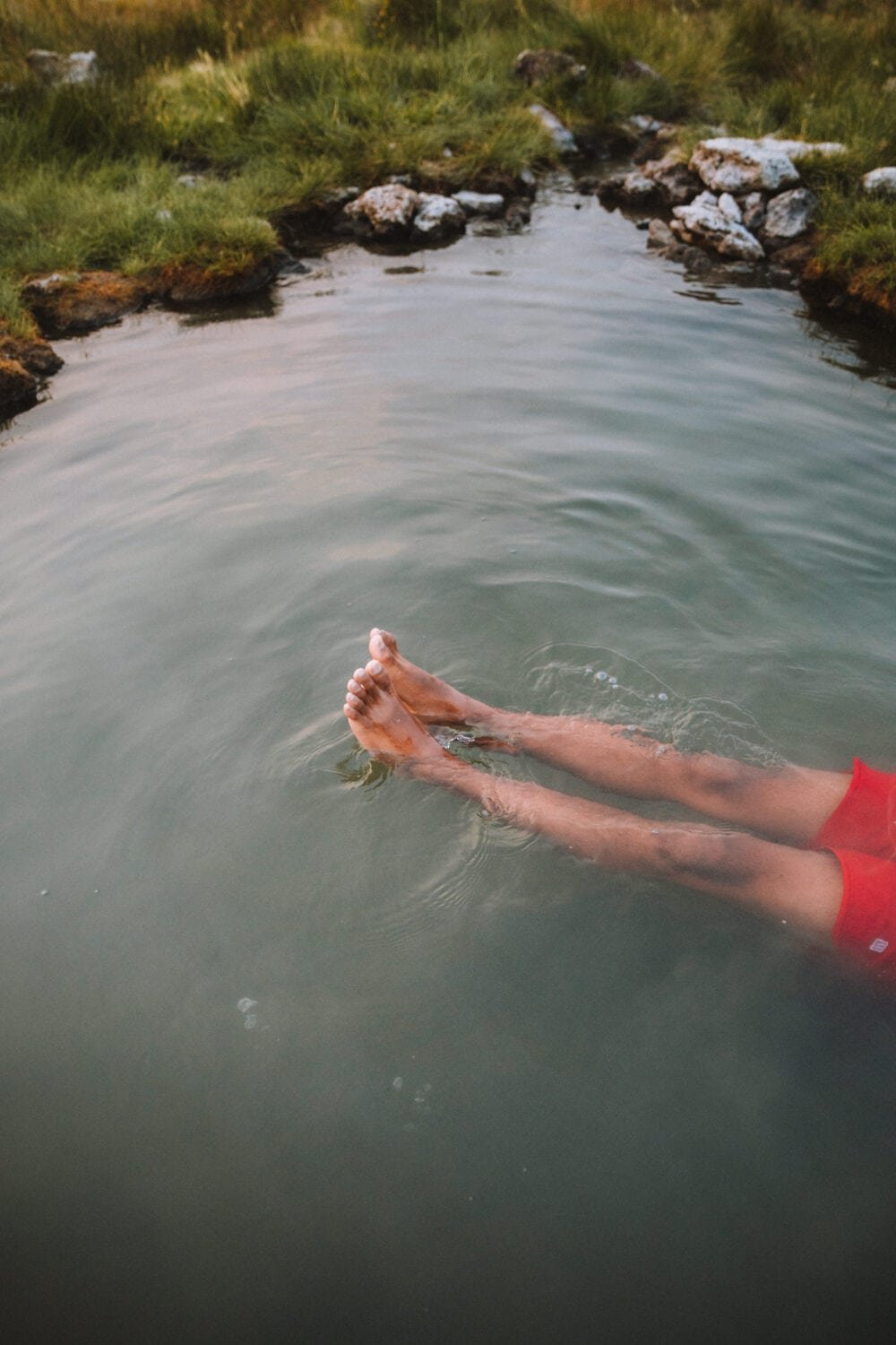 Feet soaking in natural oregon hot springs