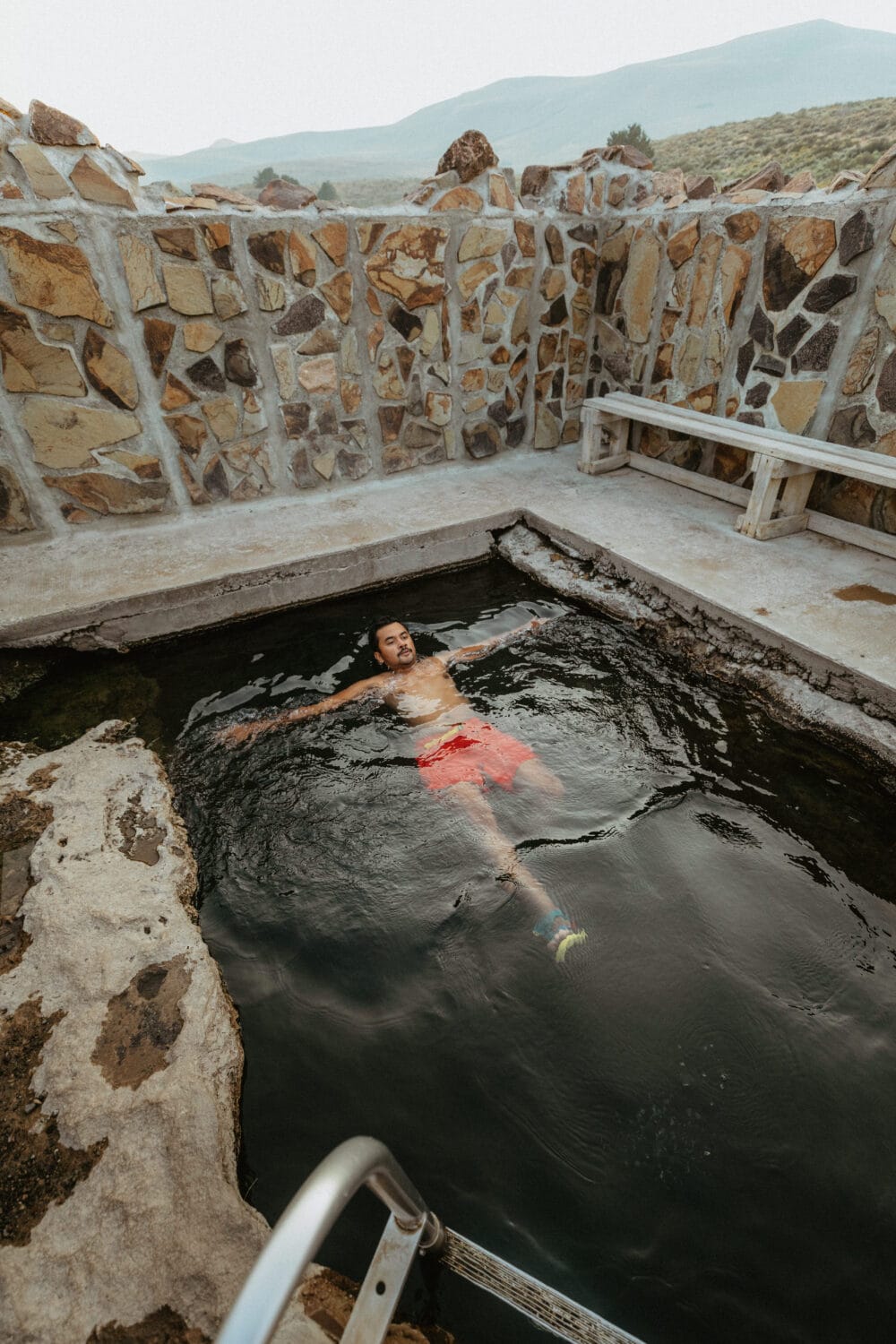 Berty Mandagie floating in Hart Mountain Hot Springs