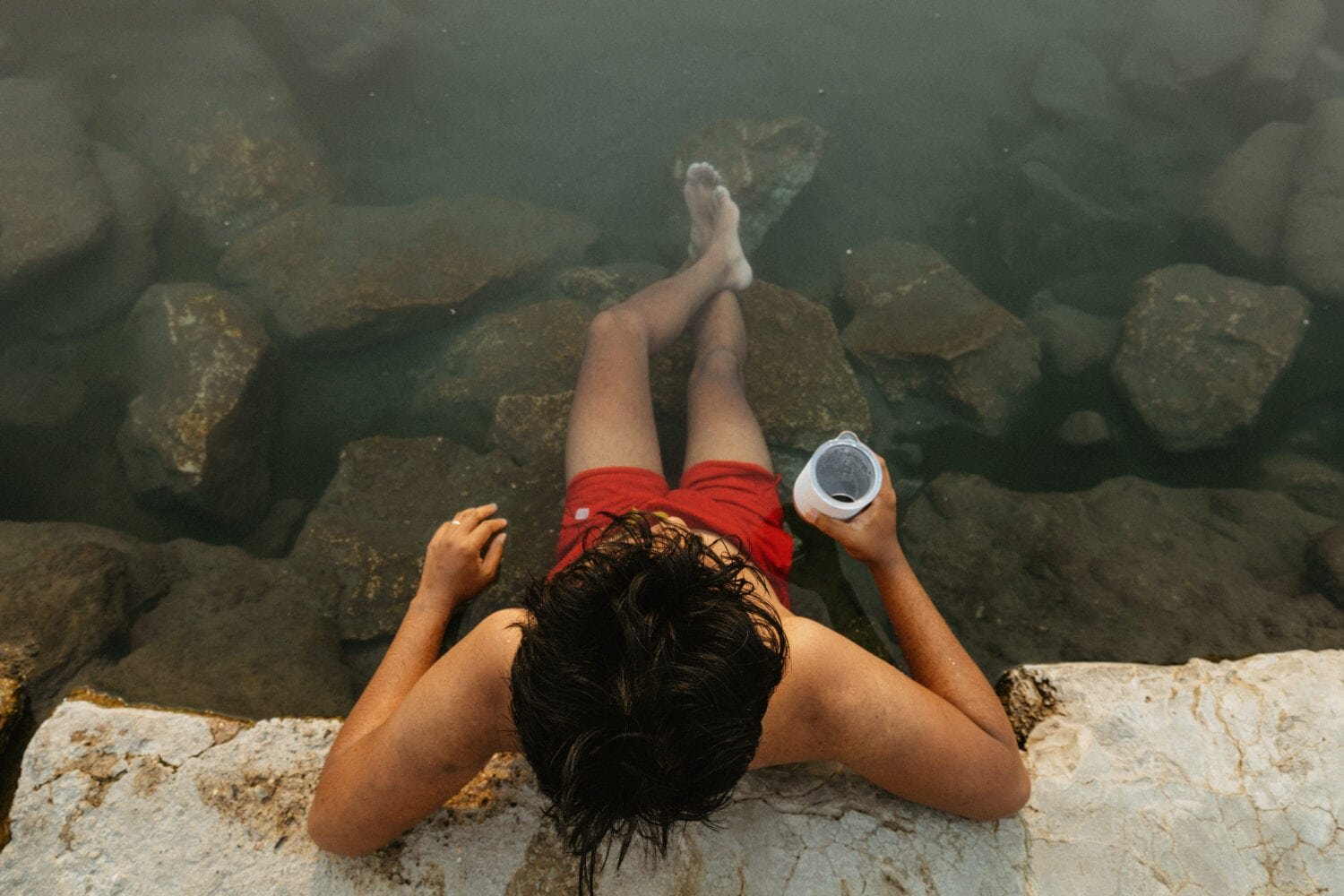 Berty Mandagie soaking in Willow Creek Hot Springs