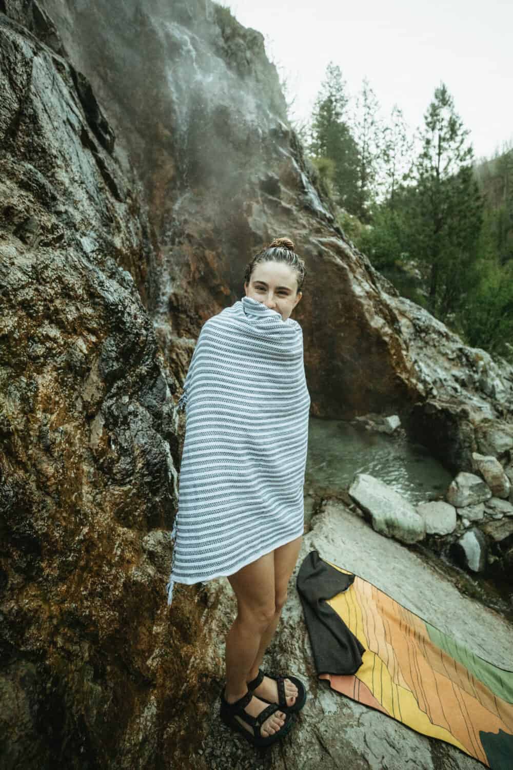 Emily Mandagie wrapped in a towel